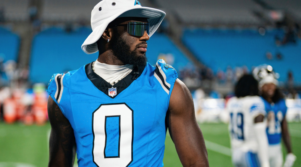 FILE - Carolina Panthers outside linebacker Brian Burns (0) looks on after a preseason NFL football game against the Detroit Lions Friday, Aug. 25, 2023, in Charlotte, N.C. Brian Burns sat out his second consecutive practice Monday, Sept. 4, because of a contract dispute, raising questions about whether the two-time Pro Bowler will play in Sunday’s regular-season opener against the Atlanta Falcons. (AP Photo/Jacob Kupferman, File)   